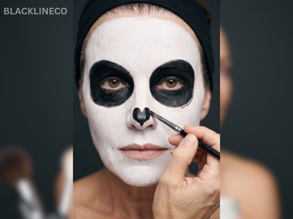 Draw a Skeleton Nose Applying black makeup to create an easy skeleton nose cavity