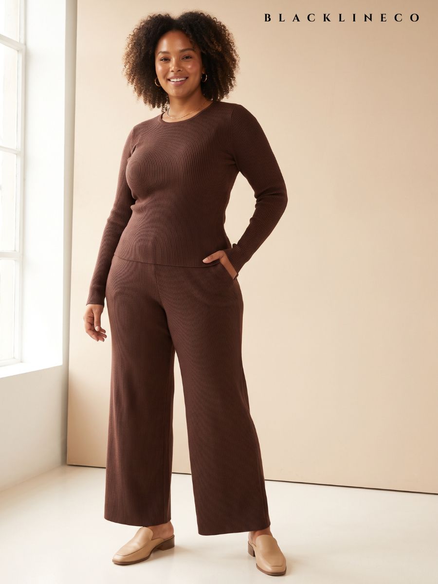 Plus size woman wearing a chocolate brown ribbed knit matching co-ord set